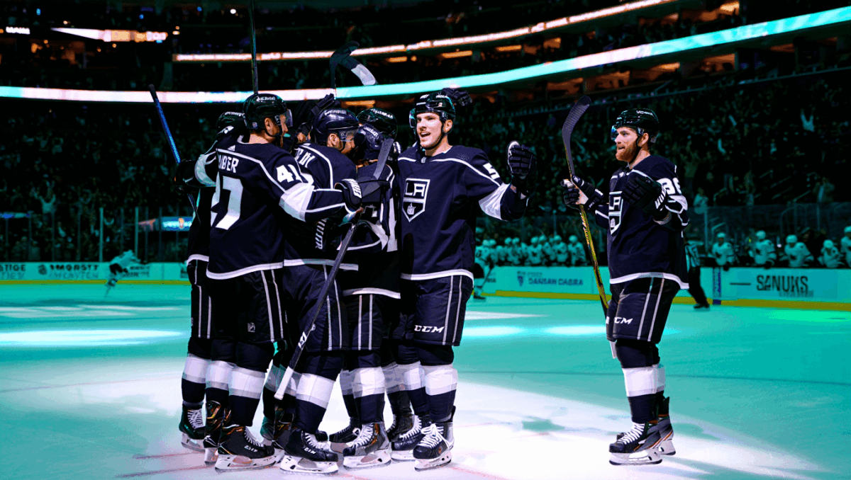 Kings beat Sharks 4-3 in Pacific Division showdown, extend winning streak