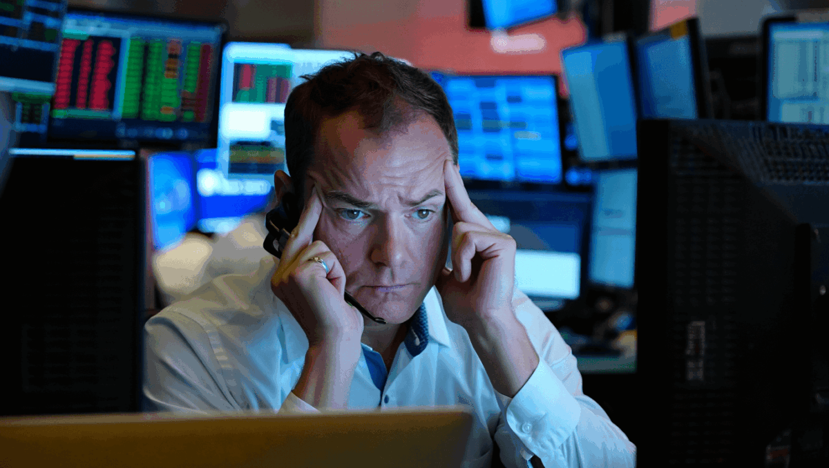 Dow Jones hits fresh record as market splits, tech stocks tumble on Broadcom earnings miss