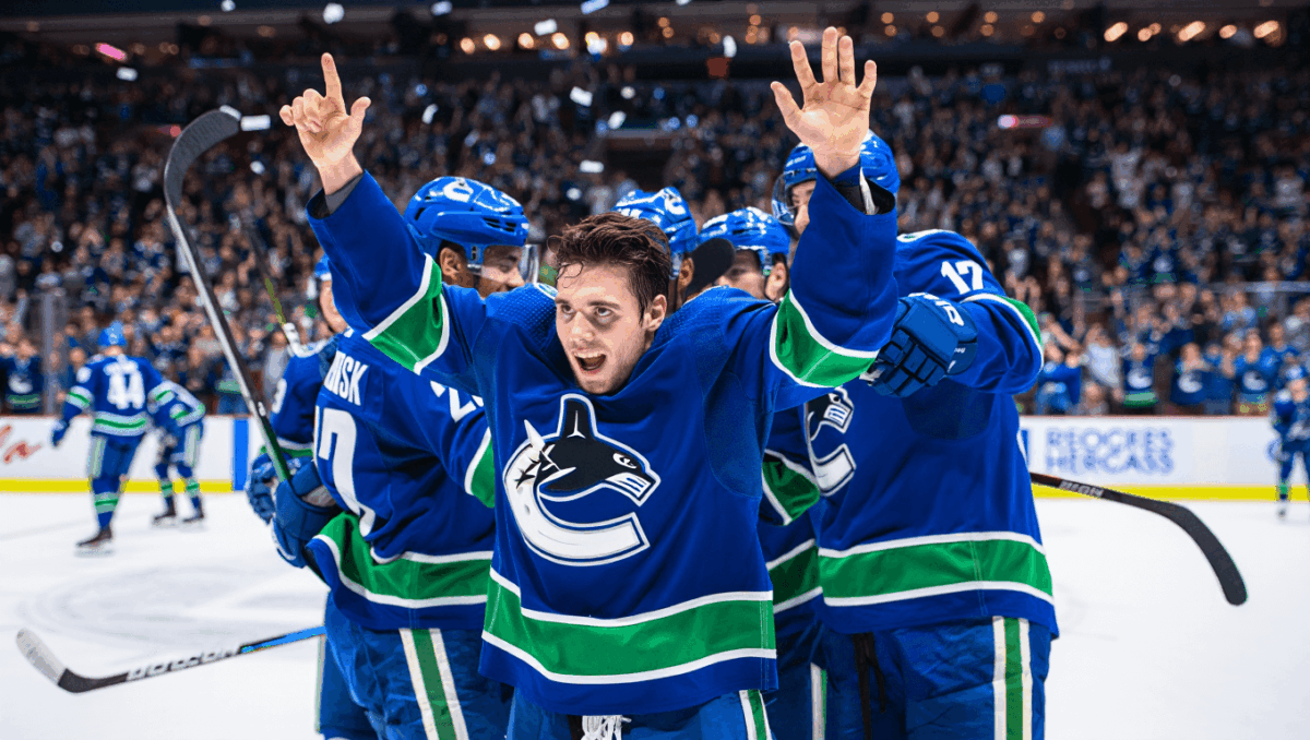 Canucks down Sharks 2-1 in overtime as DeBrusk scores thriller, Tolopilo gets first NHL win