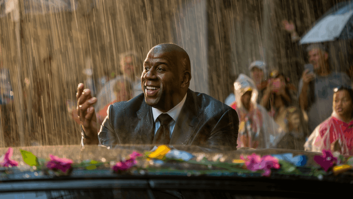 New Year's Day parade kicks off in rain with Magic Johnson leading 137th Rose Parade in historic wet conditions