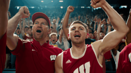 Michigan basketball coach Dusty May's undefeated Wolverines face Wisconsin tonight