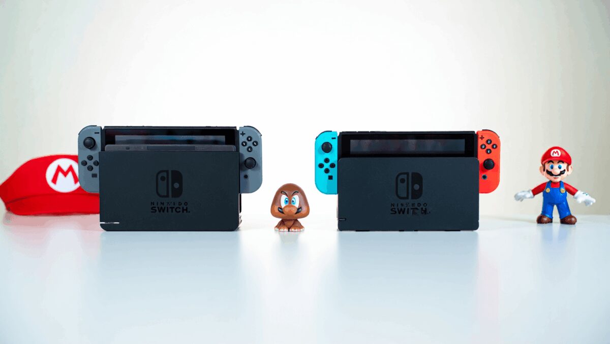 Super Mario Switch games on a wooden table