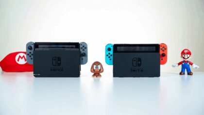 Super Mario Switch games on a wooden table