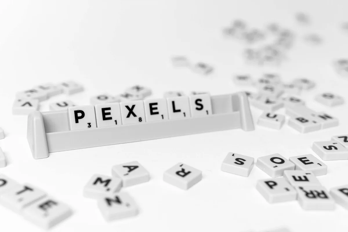 Wordle puzzle board showing colored letter tiles and guessing interface
