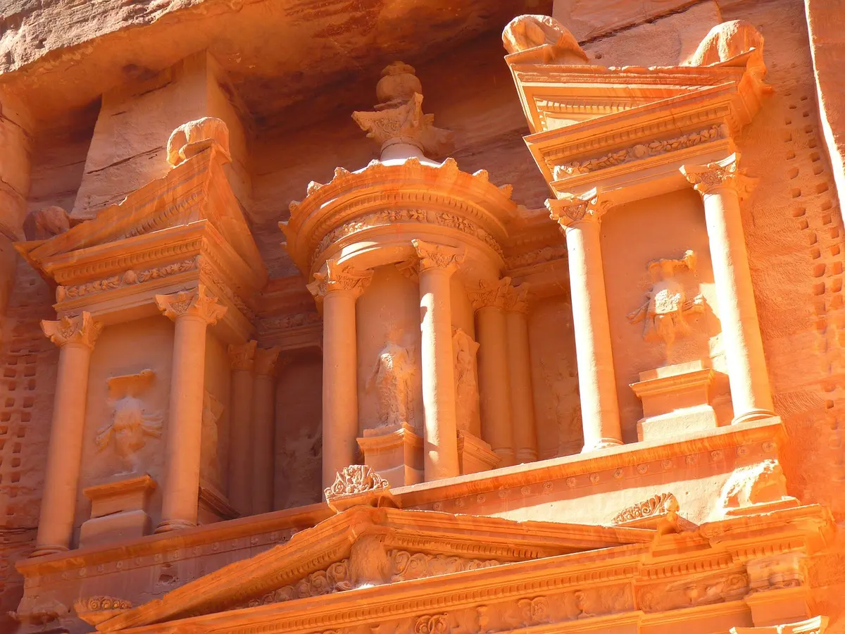 Dark ride attraction with temple ruins and adventure-themed scenery
