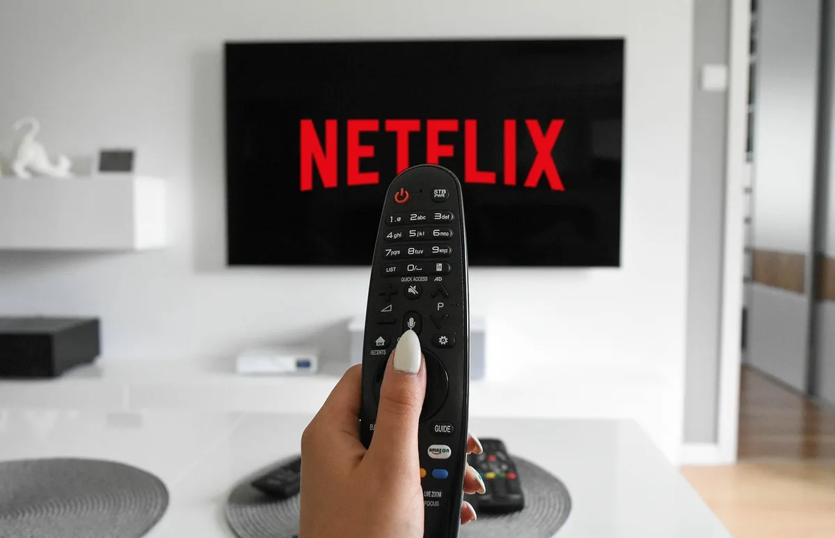 Viewer relaxing while watching multiple episodes of a show in one sitting