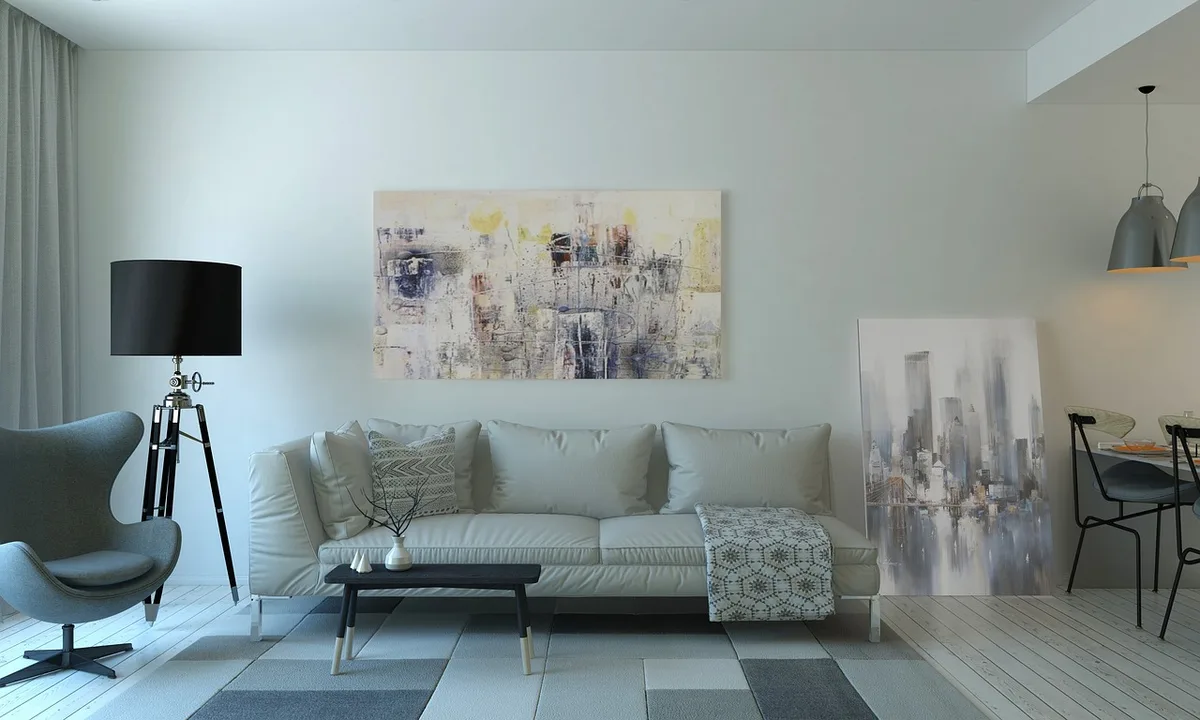 Daytime living room with a Nintendo Switch on a coffee table and hands holding Joy-Con controllers